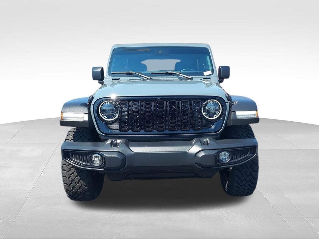 2024 Jeep Wrangler — rear three-quarter view
