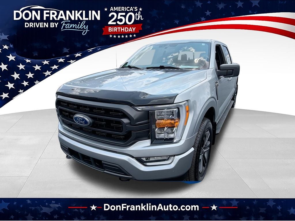 2023 Ford F-150 XLT in Silver Metallic — front three-quarter view