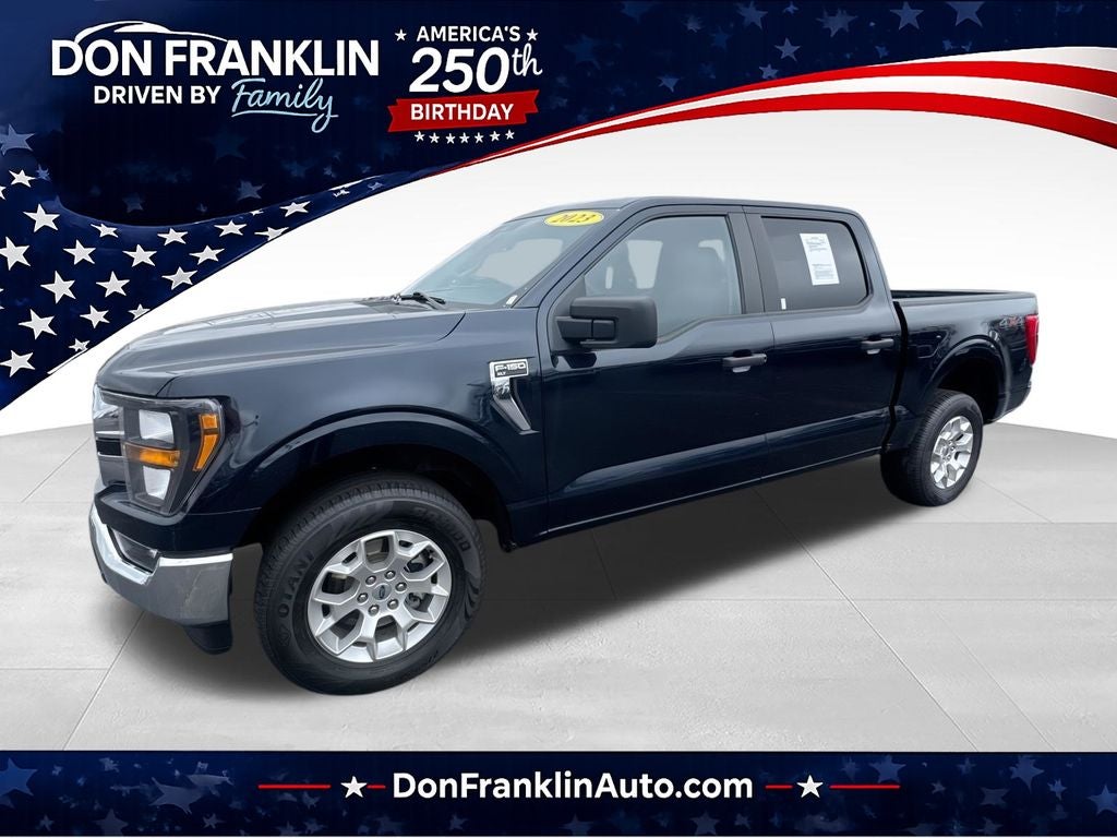 2023 Ford F-150 XLT in Blue Metallic — front three-quarter view